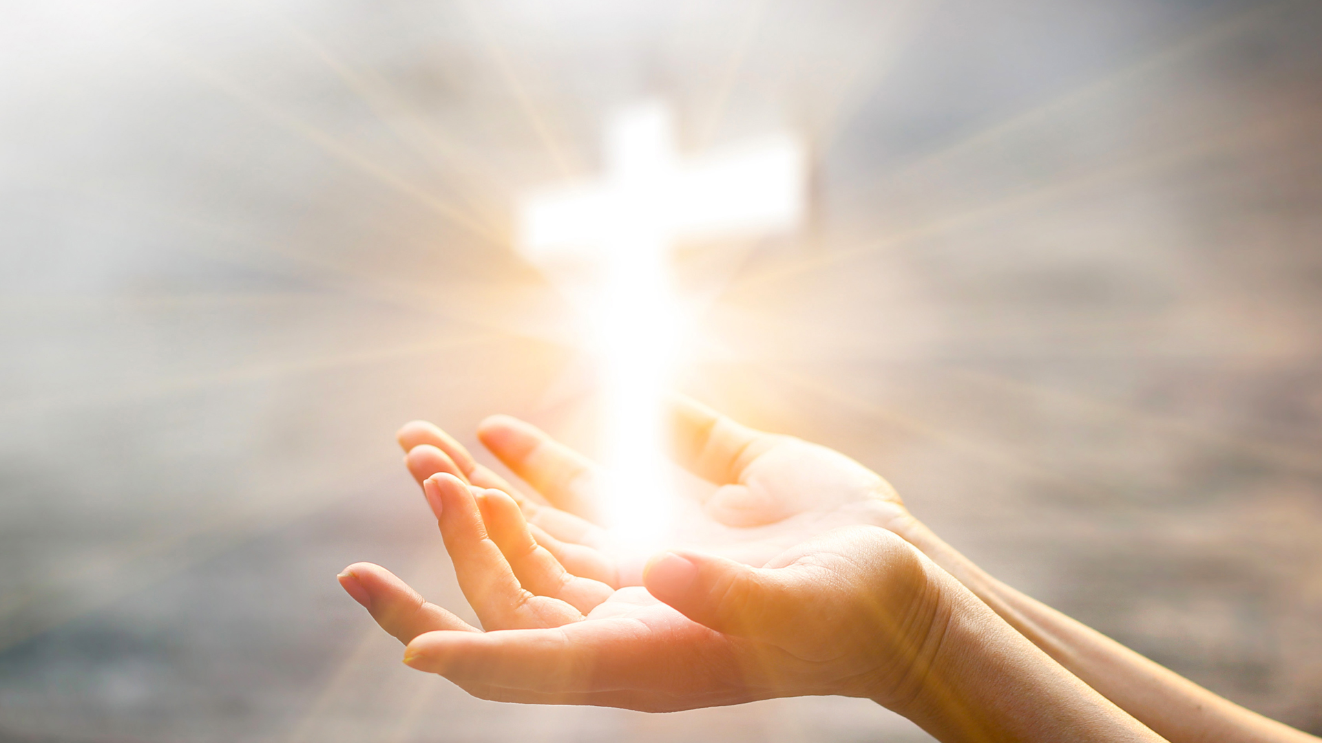 hand with cross dreamstime_xxl_113541318 copy